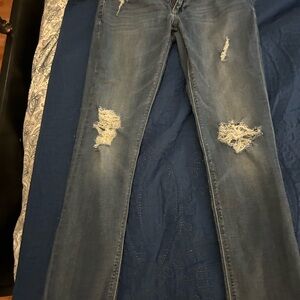 Distressed Blue Jeans